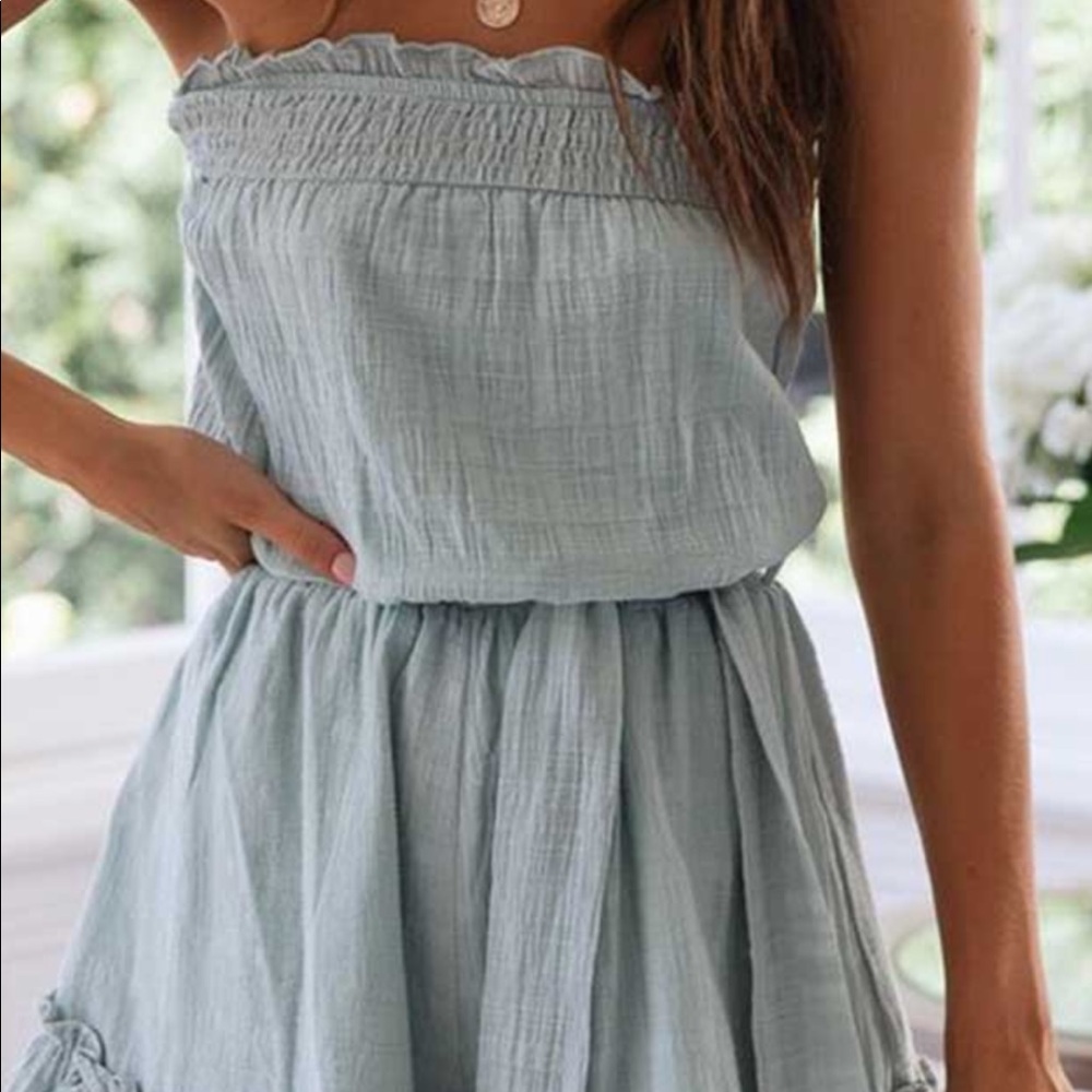 Light clue strapless ruffle romper